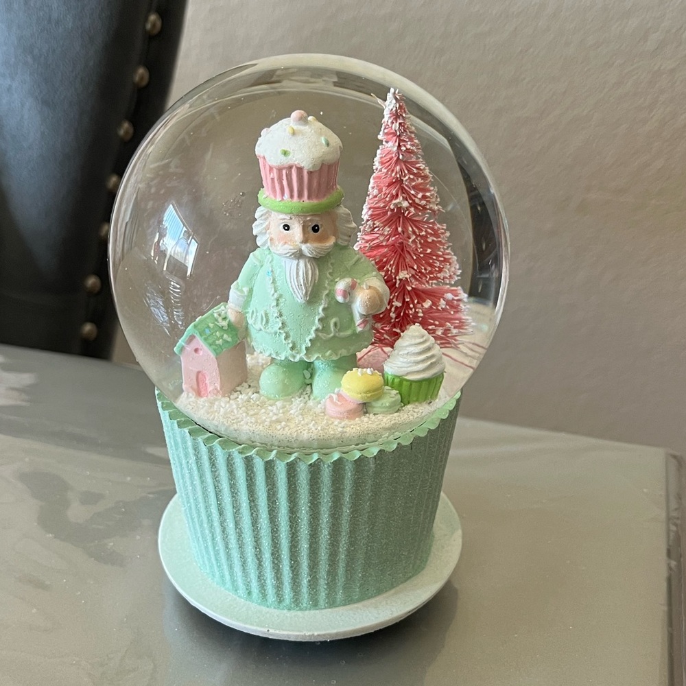 Pastel nutcracker snow globe